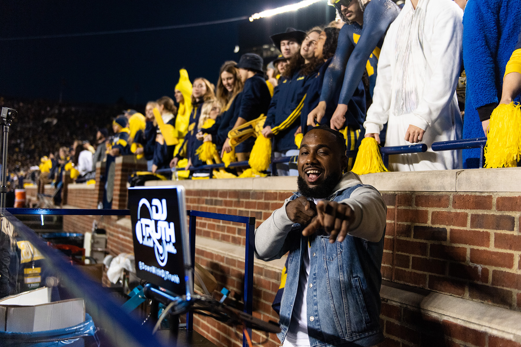 DJ Truth in front of the Michigan Student Section
