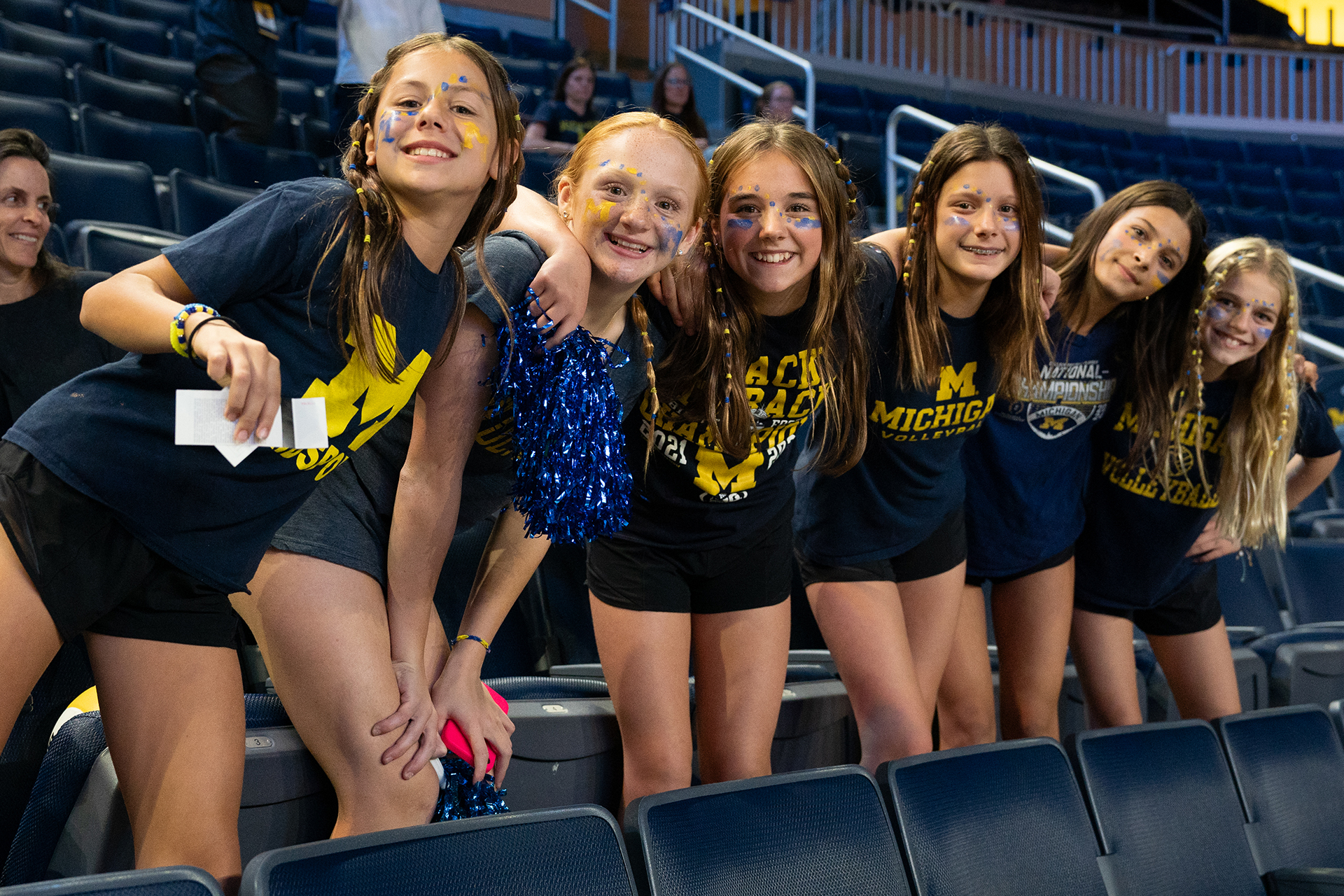 Kids in blue Michigan gear