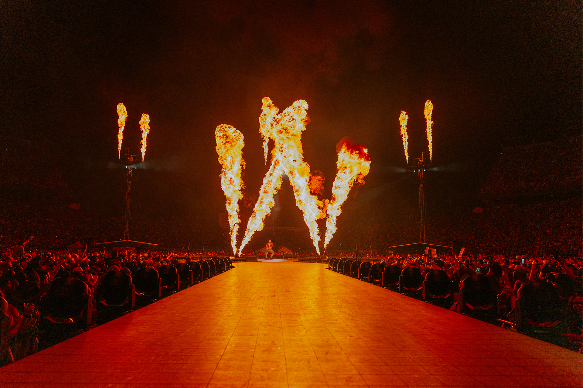 Fire pyrotechnics shooting in the shape of a W