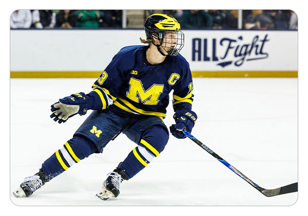 T.J. Hughes in blue jersey